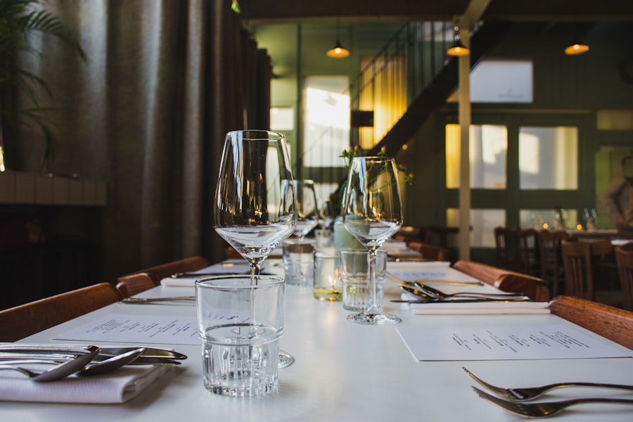 Set restaurant table with wine glasses, representing hospitality marketing